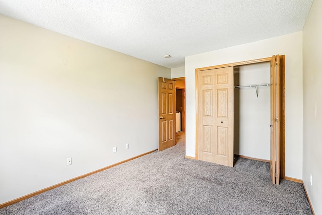 3730 Vermilion Ct S Unit 509, Eagan, MN 55122 - unfurnished bedroom featuring carpet floors, a closet, and a textured ceiling