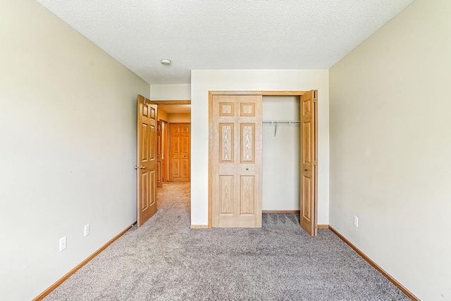 3730 Vermilion Ct S Unit 509, Eagan, MN 55122 - unfurnished bedroom with carpet floors, a closet, and a textured ceiling