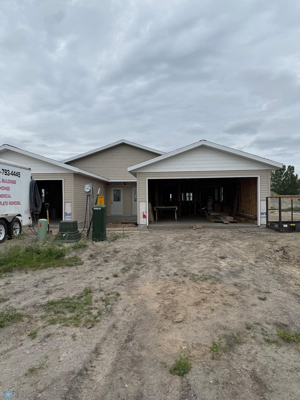 1513 Parke Ave S, Glyndon, MN 56547 - view of side of home featuring a garage