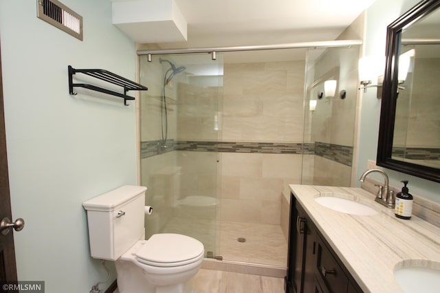 10628 Direct River Dr NW, Coon Rapids, MN 55433 - bathroom with double vanity and a shower stall