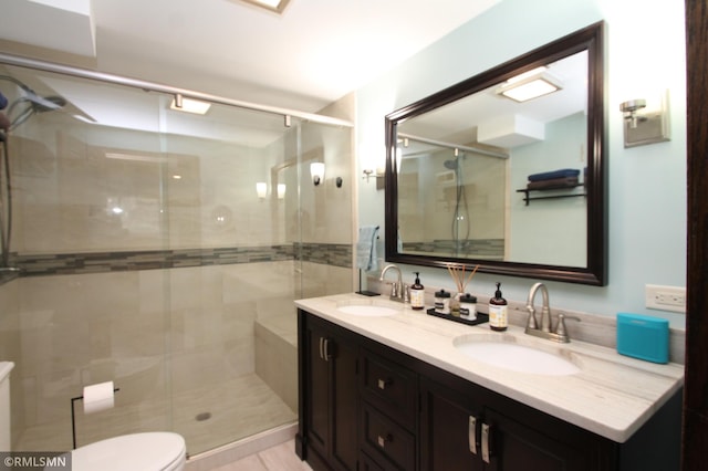 10628 Direct River Dr NW, Coon Rapids, MN 55433 - bathroom with double vanity and a stall shower