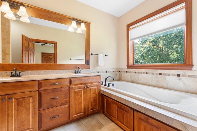 2309 Teakwood Ln SW, Rochester, MN 55902 - bathroom with double vanity, a bath, and tile patterned floors