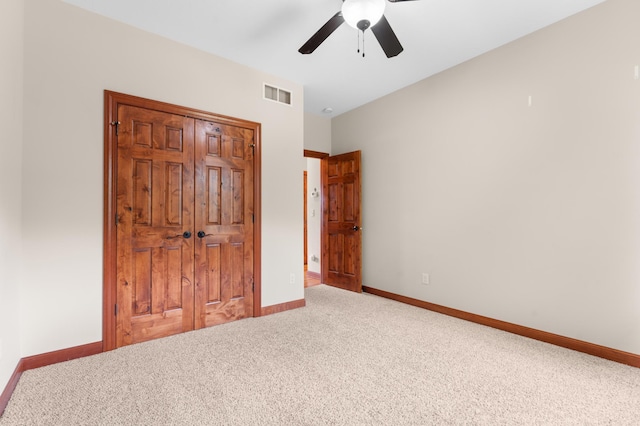 2309 Teakwood Ln SW, Rochester, MN 55902 - unfurnished bedroom with carpet and a ceiling fan