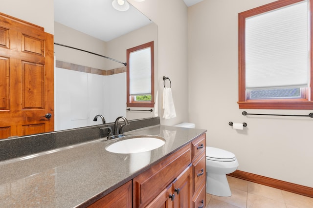 2309 Teakwood Ln SW, Rochester, MN 55902 - full bath featuring tile patterned flooring, vanity, and a shower