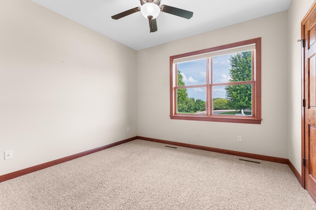 2309 Teakwood Ln SW, Rochester, MN 55902 - empty room with light colored carpet and a ceiling fan