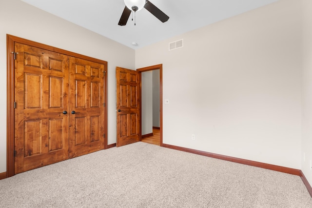 2309 Teakwood Ln SW, Rochester, MN 55902 - unfurnished bedroom with carpet and ceiling fan