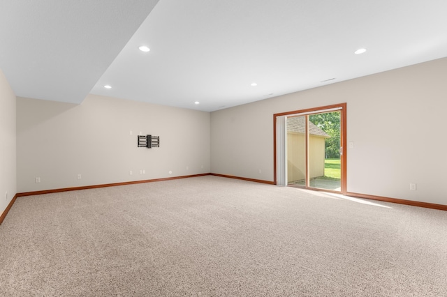 2309 Teakwood Ln SW, Rochester, MN 55902 - unfurnished room featuring light colored carpet and recessed lighting