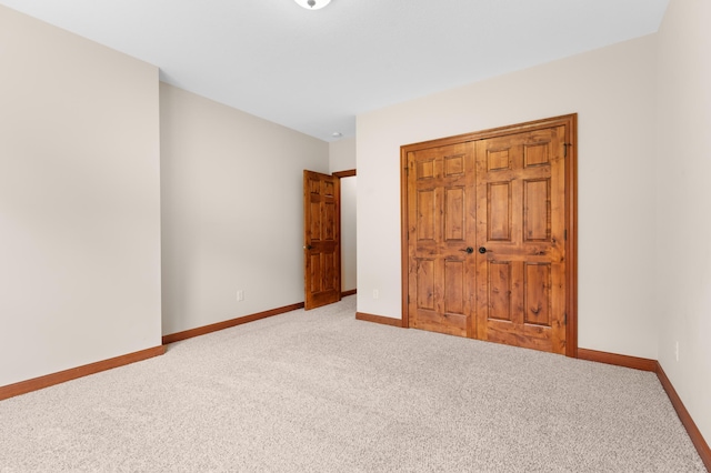 2309 Teakwood Ln SW, Rochester, MN 55902 - unfurnished bedroom with carpet and a closet