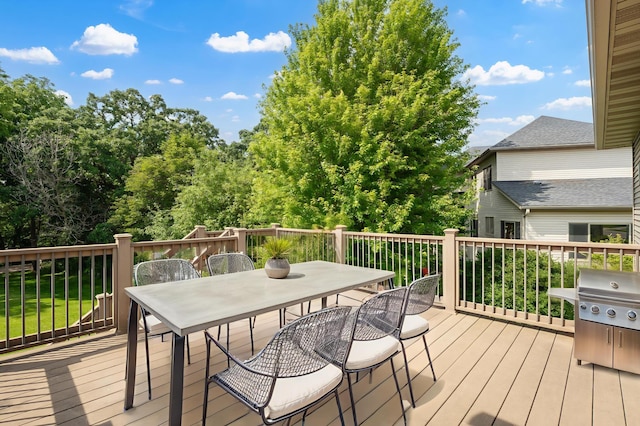 2309 Teakwood Ln SW, Rochester, MN 55902 - wooden terrace featuring outdoor dining space and a grill