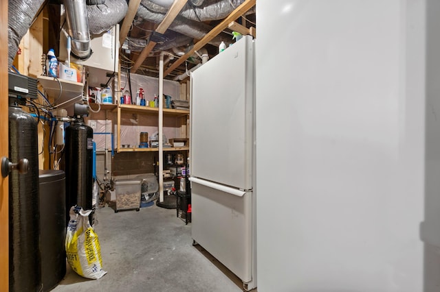 15784 103rd St SE, Becker Twp, MN 55308 - unfinished basement featuring freestanding refrigerator and a water softener system
