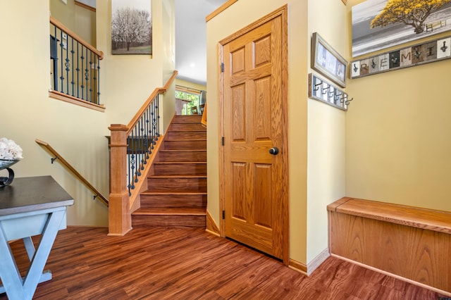 15784 103rd St SE, Becker Twp, MN 55308 - foyer entrance featuring wood finished floors and stairway