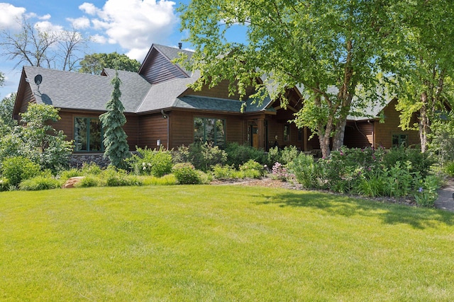9449 Ehler Ave SE, Delano, MN 55328 - view of front of home featuring a front yard and a shingled roof