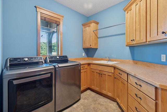9449 Ehler Ave SE, Delano, MN 55328 - laundry room with washing machine and dryer and cabinet space