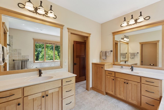 9449 Ehler Ave SE, Delano, MN 55328 - bathroom with two vanities and tile patterned flooring