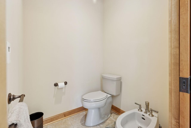 9449 Ehler Ave SE, Delano, MN 55328 - bathroom featuring a bidet and tile patterned flooring