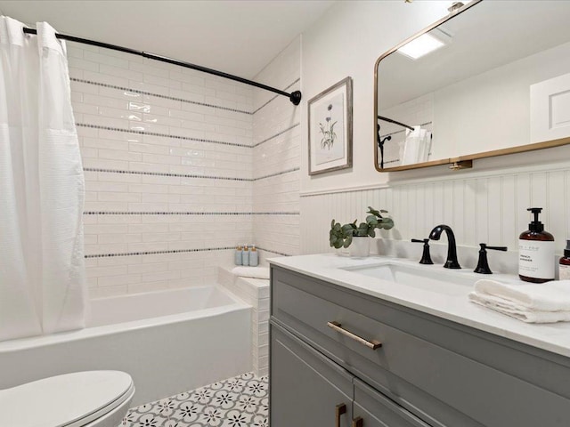 12698 Omega Ln, Center Twp, MN 56465 - bathroom with vanity, shower / bath combination with curtain, and a wainscoted wall