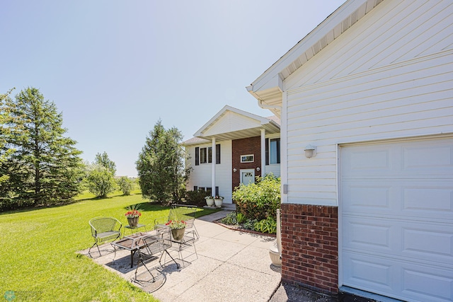 17123 Lakeview Ln, Audubon, MN 56511 - view of patio / terrace featuring a garage
