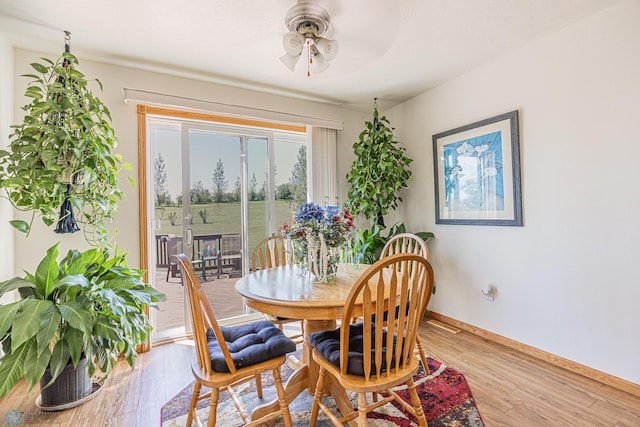 17123 Lakeview Ln, Audubon, MN 56511 - dining area with a ceiling fan and wood finished floors