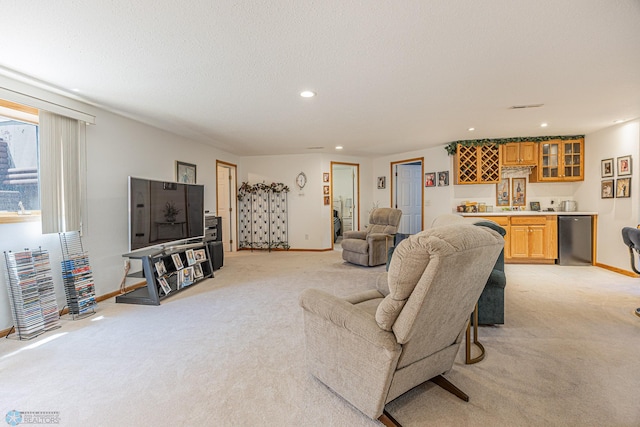 17123 Lakeview Ln, Audubon, MN 56511 - living room featuring light carpet, bar with sink, and recessed lighting