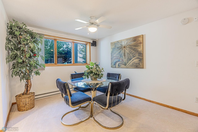 17123 Lakeview Ln, Audubon, MN 56511 - dining space with a baseboard heating unit, carpet floors, and a ceiling fan