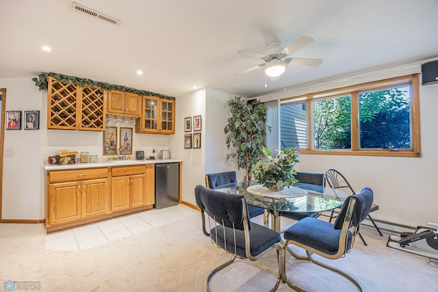 17123 Lakeview Ln, Audubon, MN 56511 - dining space with light colored carpet, bar with sink, a ceiling fan, light tile patterned flooring, and recessed lighting