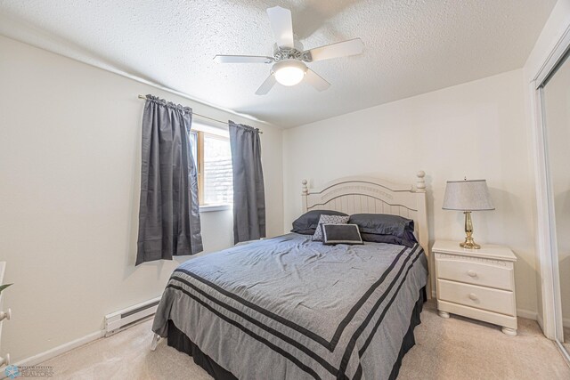 17123 Lakeview Ln, Audubon, MN 56511 - bedroom featuring baseboard heating, light carpet, a textured ceiling, and a ceiling fan