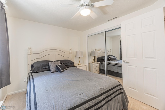17123 Lakeview Ln, Audubon, MN 56511 - bedroom featuring light carpet, a closet, and ceiling fan