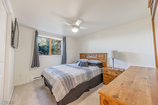 17123 Lakeview Ln, Audubon, MN 56511 - bedroom with a baseboard heating unit, light carpet, a ceiling fan, and a textured ceiling