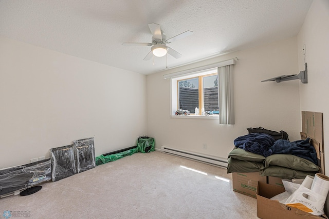 17123 Lakeview Ln, Audubon, MN 56511 - unfurnished room with baseboard heating, a ceiling fan, carpet flooring, and a textured ceiling