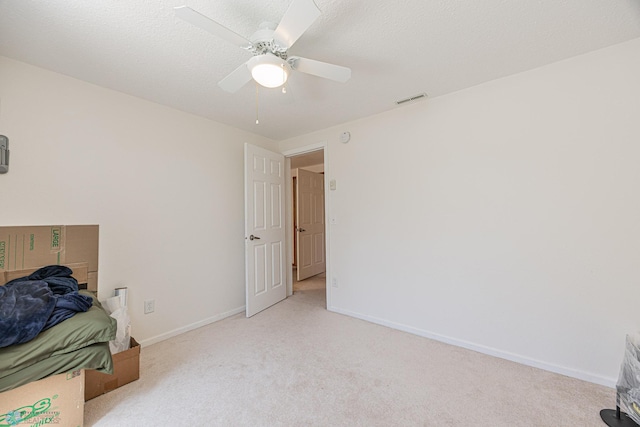 17123 Lakeview Ln, Audubon, MN 56511 - unfurnished bedroom featuring light colored carpet and a ceiling fan
