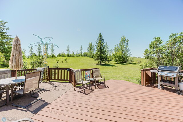 17123 Lakeview Ln, Audubon, MN 56511 - wooden terrace with a grill, outdoor dining area, and a lawn
