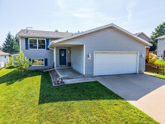 724 50th Ave NW, Rochester, MN 55901 - split level home featuring a garage and driveway