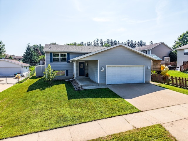 724 50th Ave NW, Rochester, MN 55901 - split level home featuring a garage and driveway