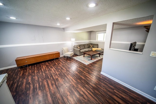 724 50th Ave NW, Rochester, MN 55901 - living room with wood finished floors, a textured ceiling, and recessed lighting