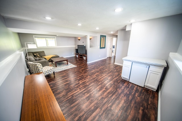 724 50th Ave NW, Rochester, MN 55901 - living area featuring dark wood finished floors and recessed lighting