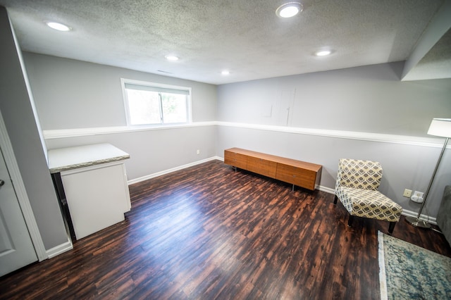 724 50th Ave NW, Rochester, MN 55901 - unfurnished room with wood finished floors, a textured ceiling, and recessed lighting