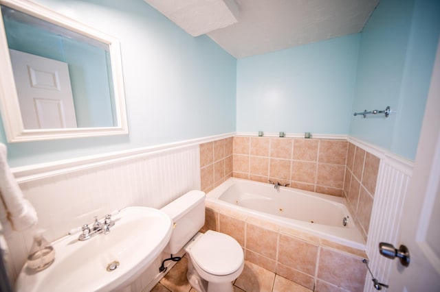 724 50th Ave NW, Rochester, MN 55901 - full bath featuring a jetted tub, wainscoting, and tile patterned flooring