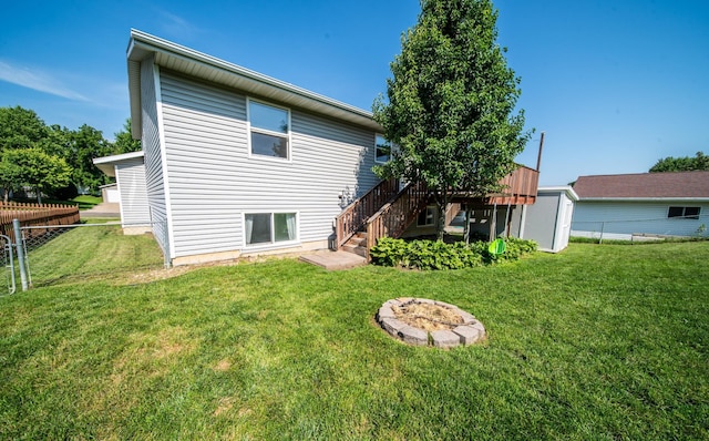 724 50th Ave NW, Rochester, MN 55901 - rear view of house with stairway and a deck