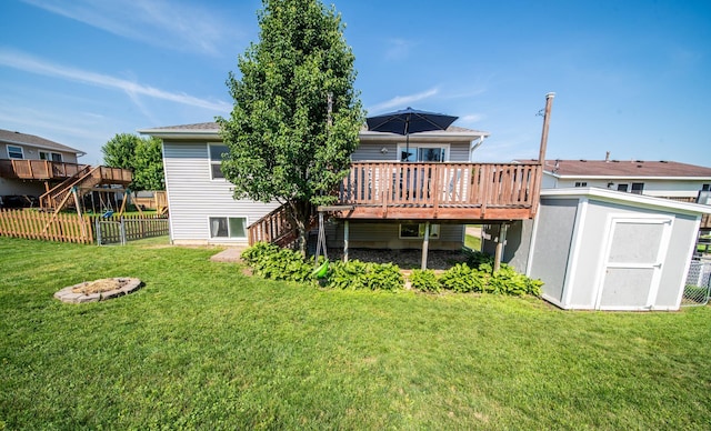 724 50th Ave NW, Rochester, MN 55901 - rear view of property featuring a wooden deck, a storage unit, and stairway