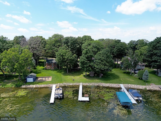 11436 Hoyer Ave NW, Annandale, MN 55302 - dock area with a water view, a lawn, and view of scattered trees