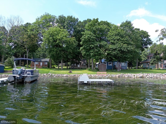 11436 Hoyer Ave NW, Annandale, MN 55302 - dock featuring a water view and a lawn