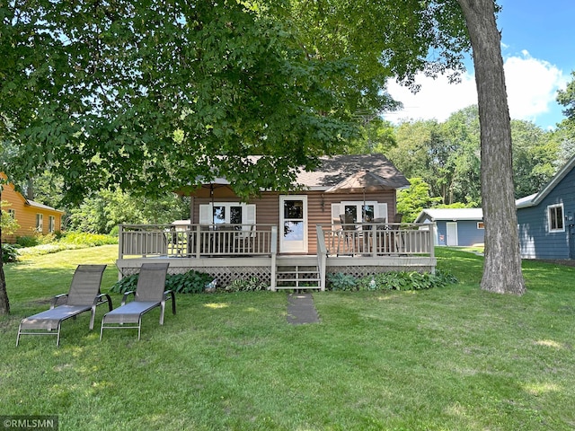 11436 Hoyer Ave NW, Annandale, MN 55302 - back of house featuring a wooden deck and a yard