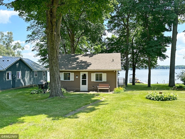 11436 Hoyer Ave NW, Annandale, MN 55302 - view of front of home with a water view and a front yard