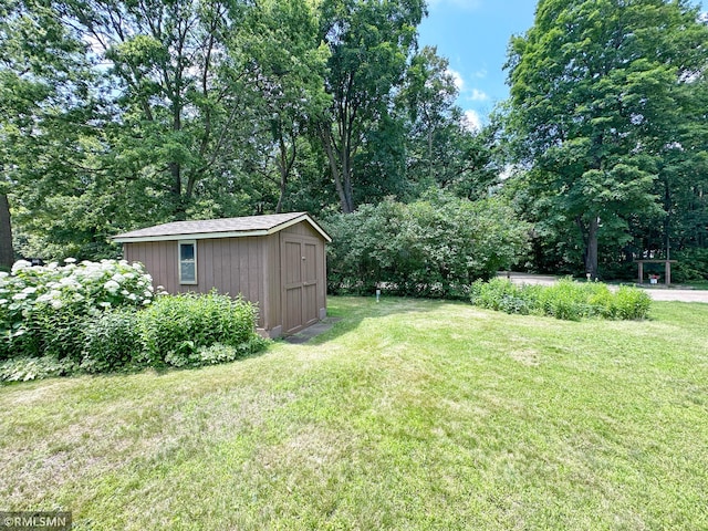 11436 Hoyer Ave NW, Annandale, MN 55302 - view of grassy yard with a storage shed