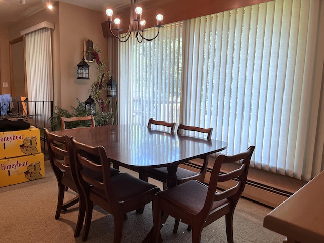 806 Highland Rd, Windom, MN 56101 - dining room with a chandelier, healthy amount of natural light, and carpet flooring