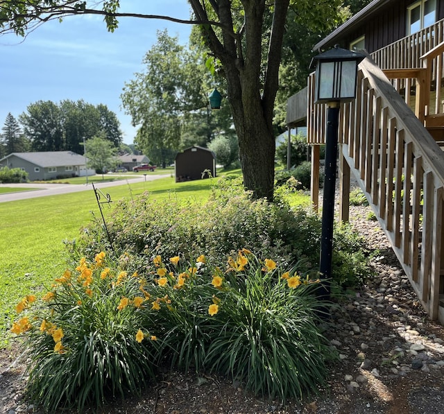 806 Highland Rd, Windom, MN 56101 - view of grassy yard with a shed