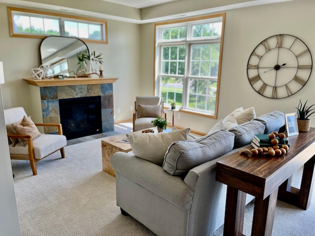 2100 Old School Rd Unit 206, Mound, MN 55364 - carpeted living room with plenty of natural light and a tiled fireplace