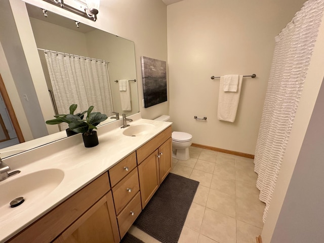 2100 Old School Rd Unit 206, Mound, MN 55364 - bathroom with double vanity, tile patterned floors, and a shower with shower curtain