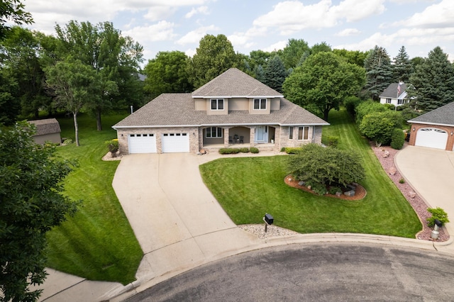 1201 Morningside Cir, Marshall, MN 56258 - traditional-style house featuring concrete driveway, a front yard, and an attached garage