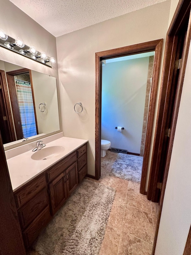 1201 Morningside Cir, Marshall, MN 56258 - bathroom featuring vanity and a textured ceiling